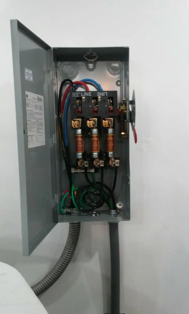 Three-phase disconnect switch installed for Smoke Detector Installation in Westbury