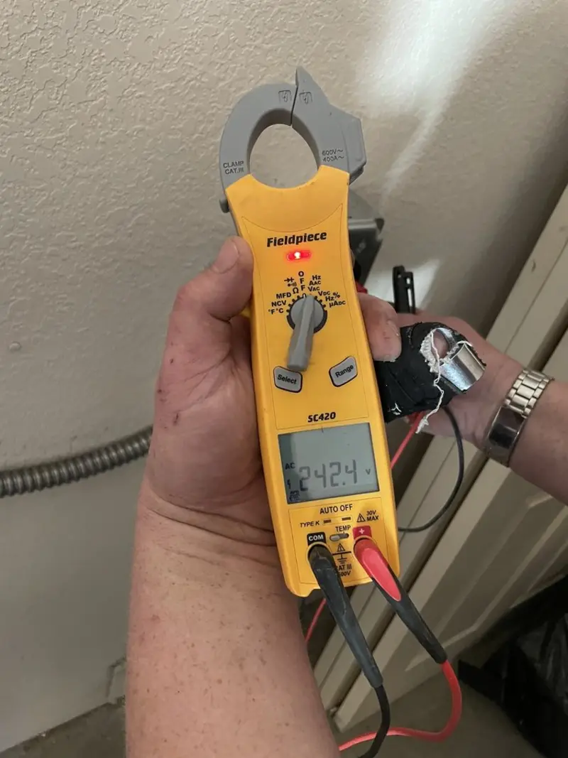 Voltage testing with clamp meter during Generator Installation in Westbury